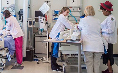 MC students training in hospital classroom